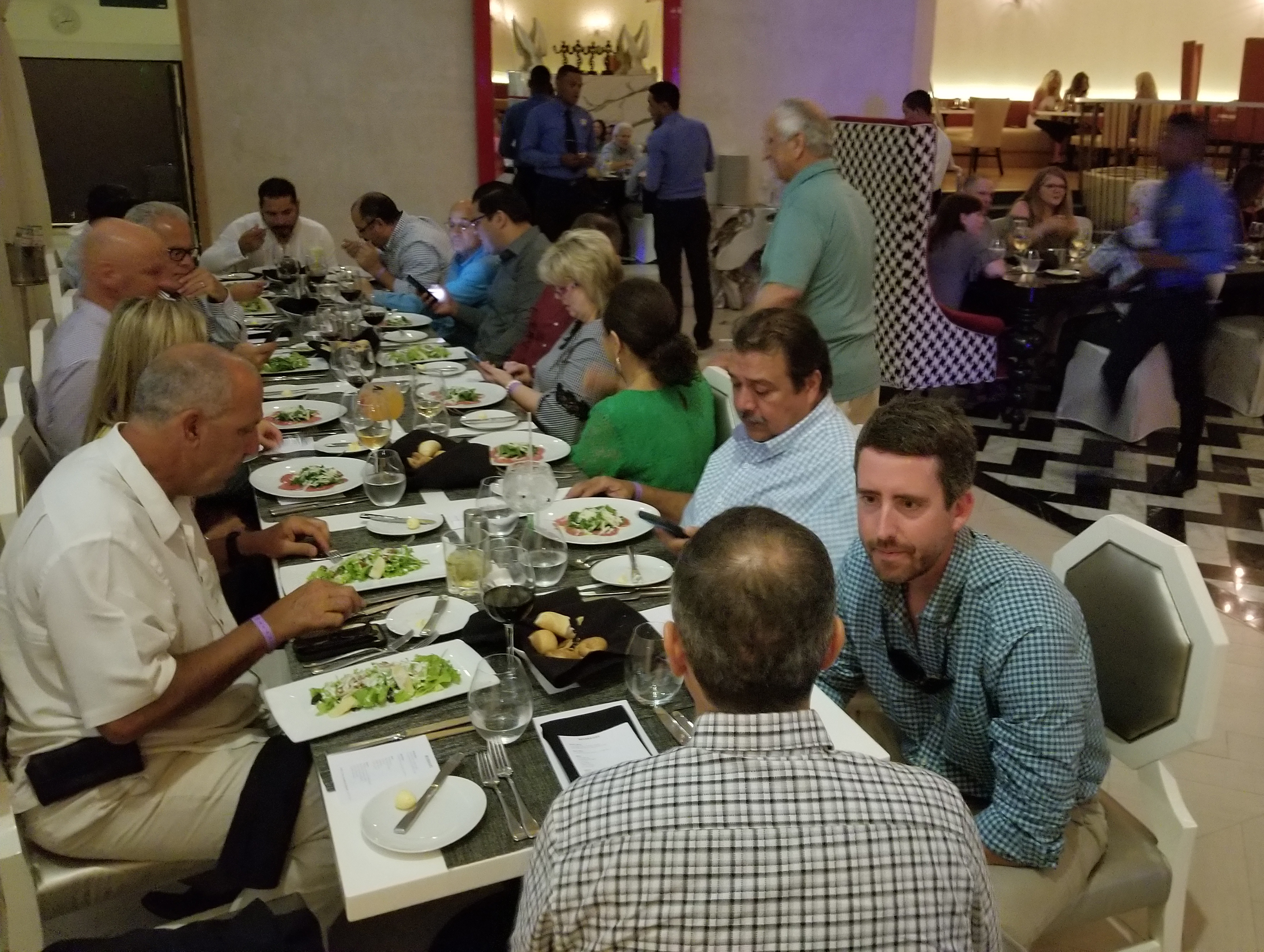 USA Rice member Ryan Carwell (far right) makes a connection
