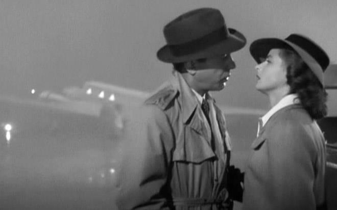 Casablanca movie ending, B&W photo with Humphrey Bogard & Ingrid Bergman, plane in background