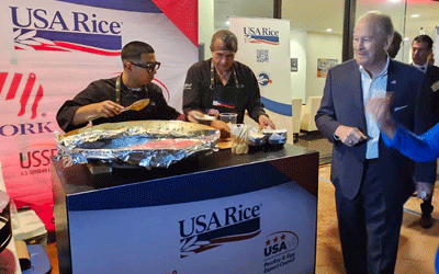 Ambassador Johnson Checks Out the USA Rice Booth