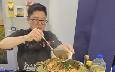 2026 IFE Tradeshow, Chef Jeremy Pang cooking US rice at USAR Booth