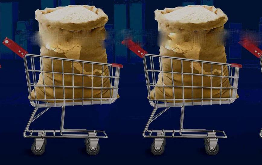 Shopping-carts filled with burlap bags of rice