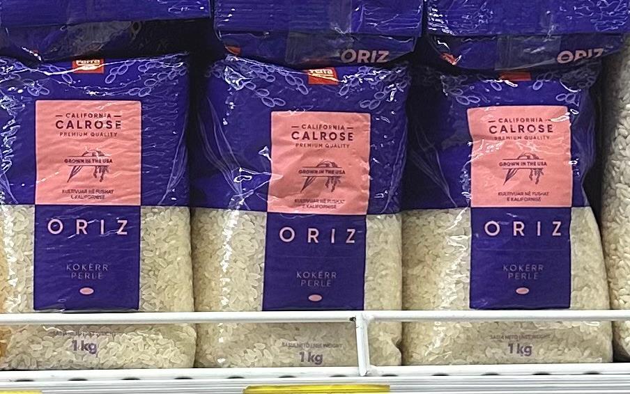 Packages of Calrose rice on grocery shelves in Albania