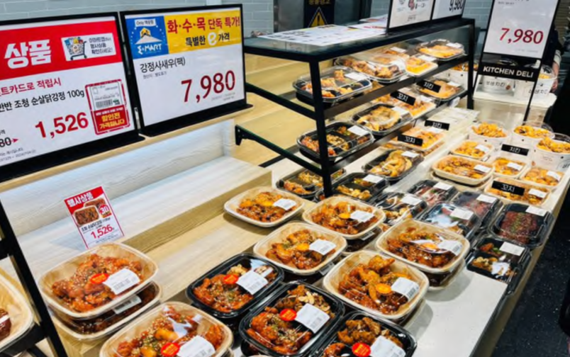 RTE foods displayed in takeout containers on counter at E Mart in South Korea