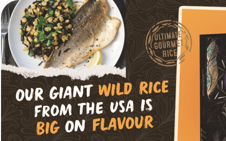 Giant wild rice promo shows rice, piece of fish, and lemon on a white plate with text