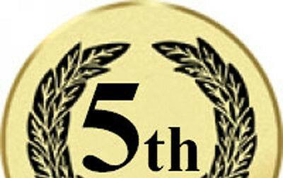 Gold circle with black leaves on border with "5th" in center  