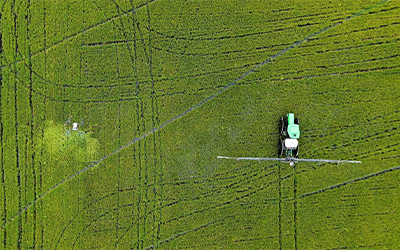 Aerial view of combine in rice farm in Brazil