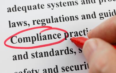 Word "compliance" circled in red ink