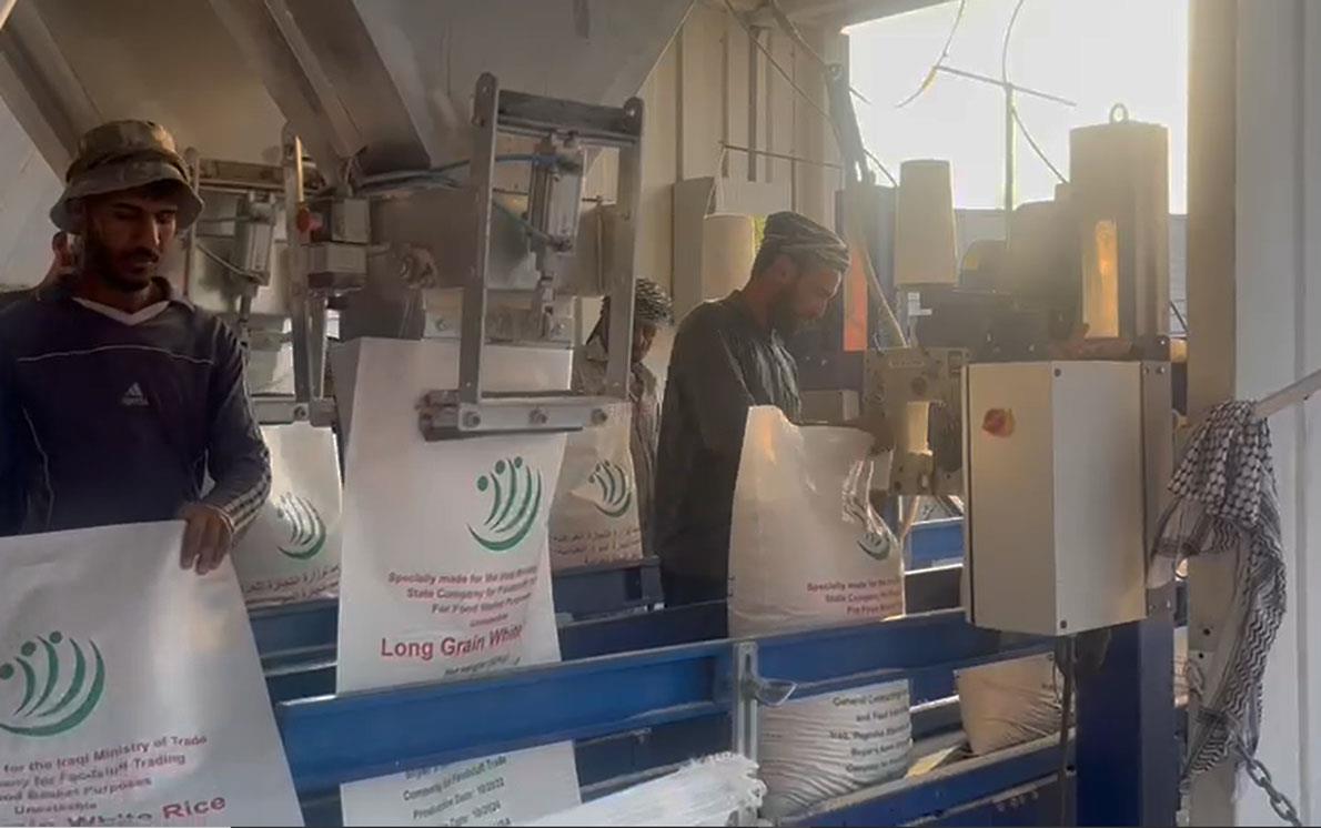 Bagging-Bulk-Rice on assembly line in Iraq