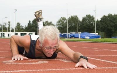 Old man crawls across finish line at track meet