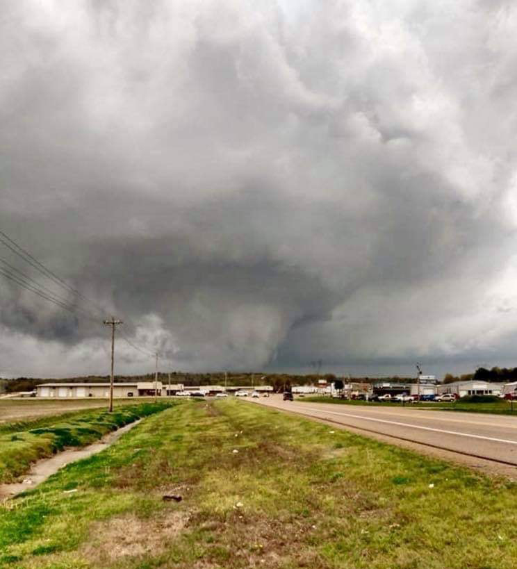 Massive tornado fills the sky above a small town