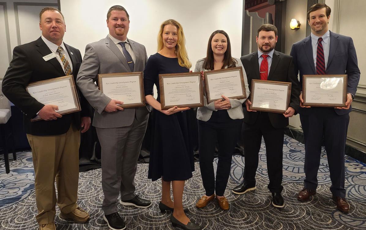 2021-23-Leadership-Class-Graduation, class members hold their diplomas