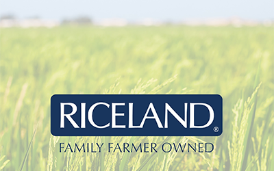 Riceland Family Farmer Owned, text in mature rice field