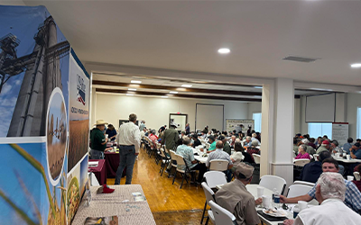 2026 TX Producers Mtg, USA Rice booth set up on right side of photo