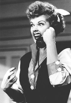 black and white movie screenshot talking on the phone