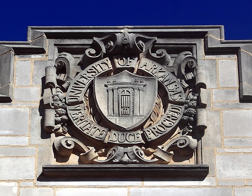 UofA seal carved in stone on campus ag building