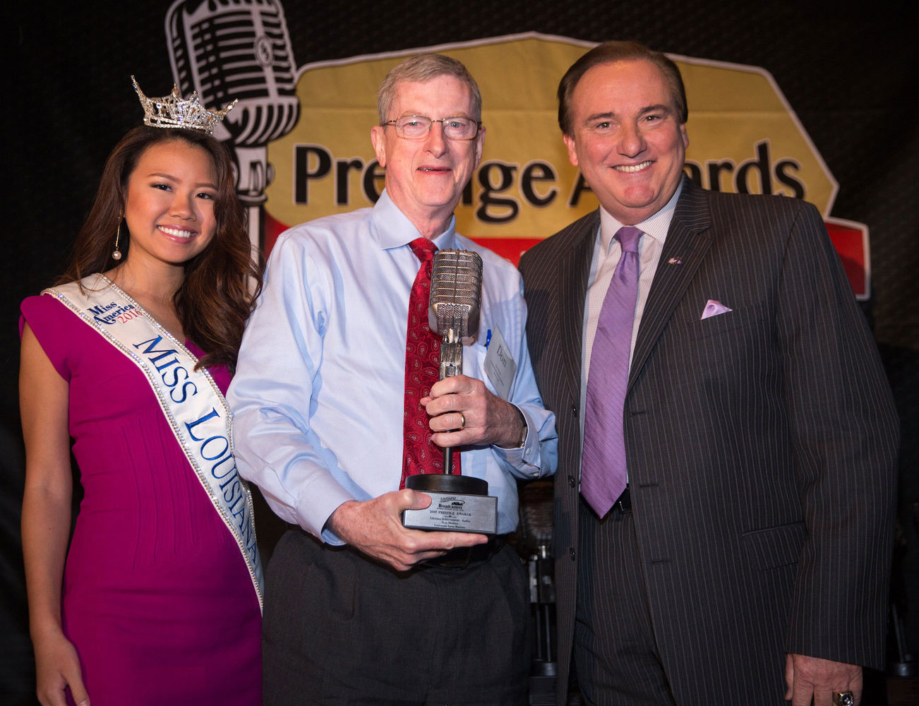 Delta Farm Press Don-Molino- receives Lifetime-Achievement-Award shaped like an old fashioned microphone