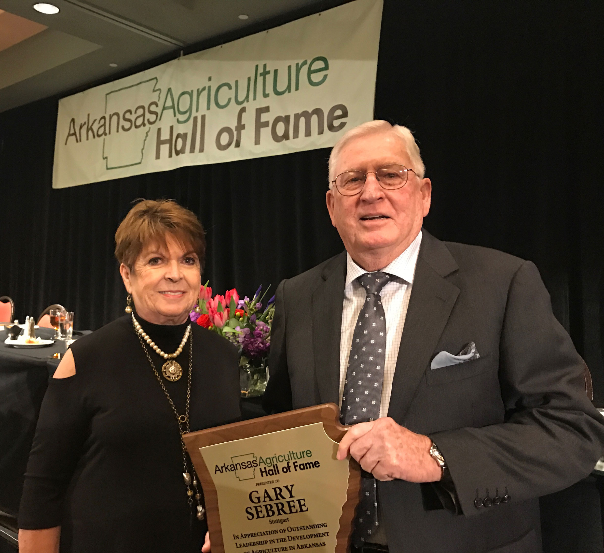 Gary-Sebree-holds his Ag-Hall-of-Fame plaque