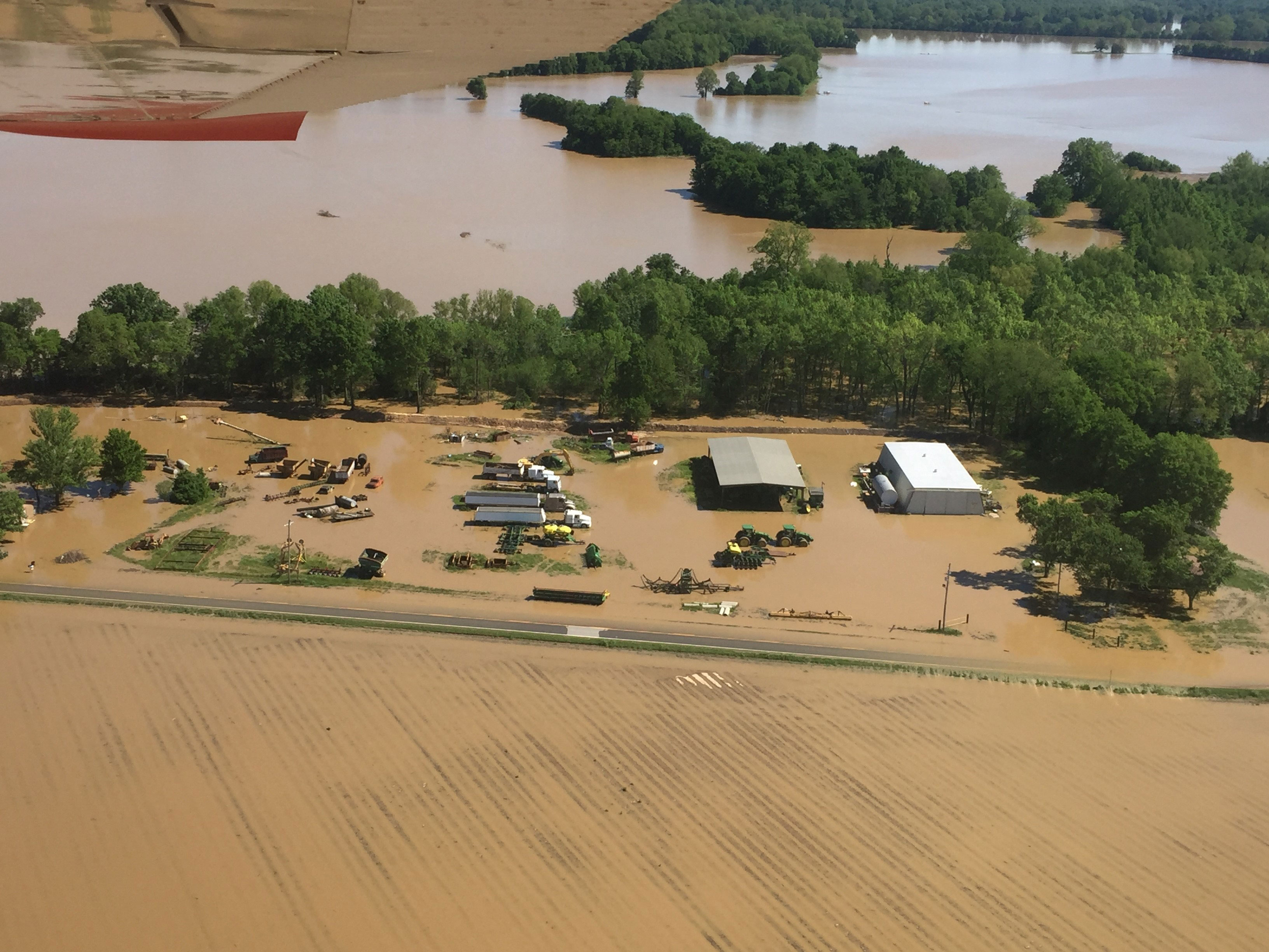Aerial-View-of AR farmer Jeff Rutledge-Farm-after-2017 Spring Flood, river overflowing its banks flooding fields, roads, buildings