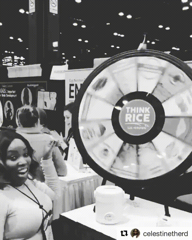 FNCE 2017 attendee spins the Think Rice Wheel (animated)