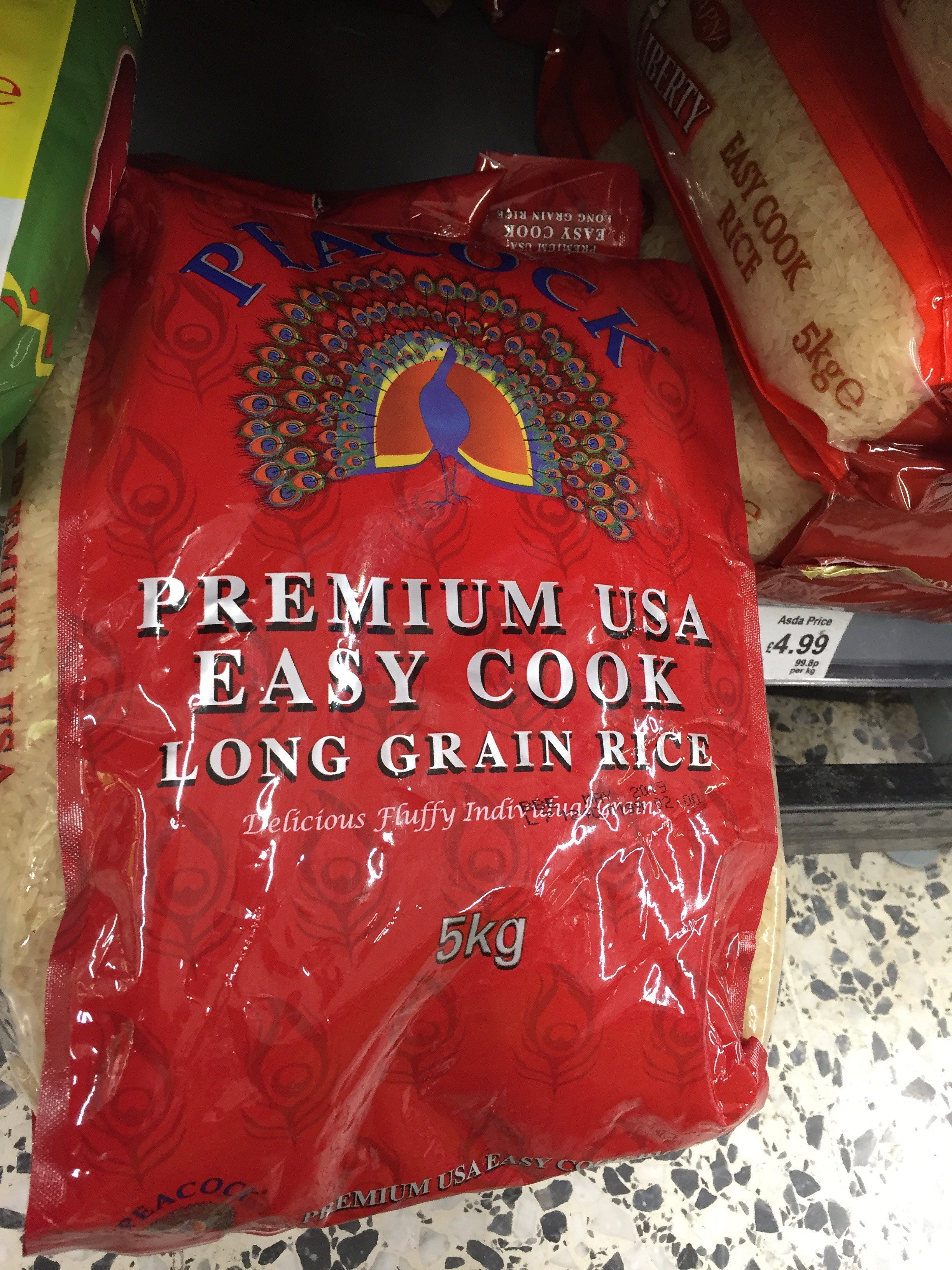 Peacock Rice Bag, red bag with peacock logo