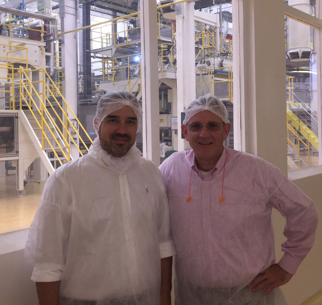 USDA-Trade-Mission-to-Brazil,-Ricardo-Marinho-&-Mark-Slupek wearing protective gear on a mill tour