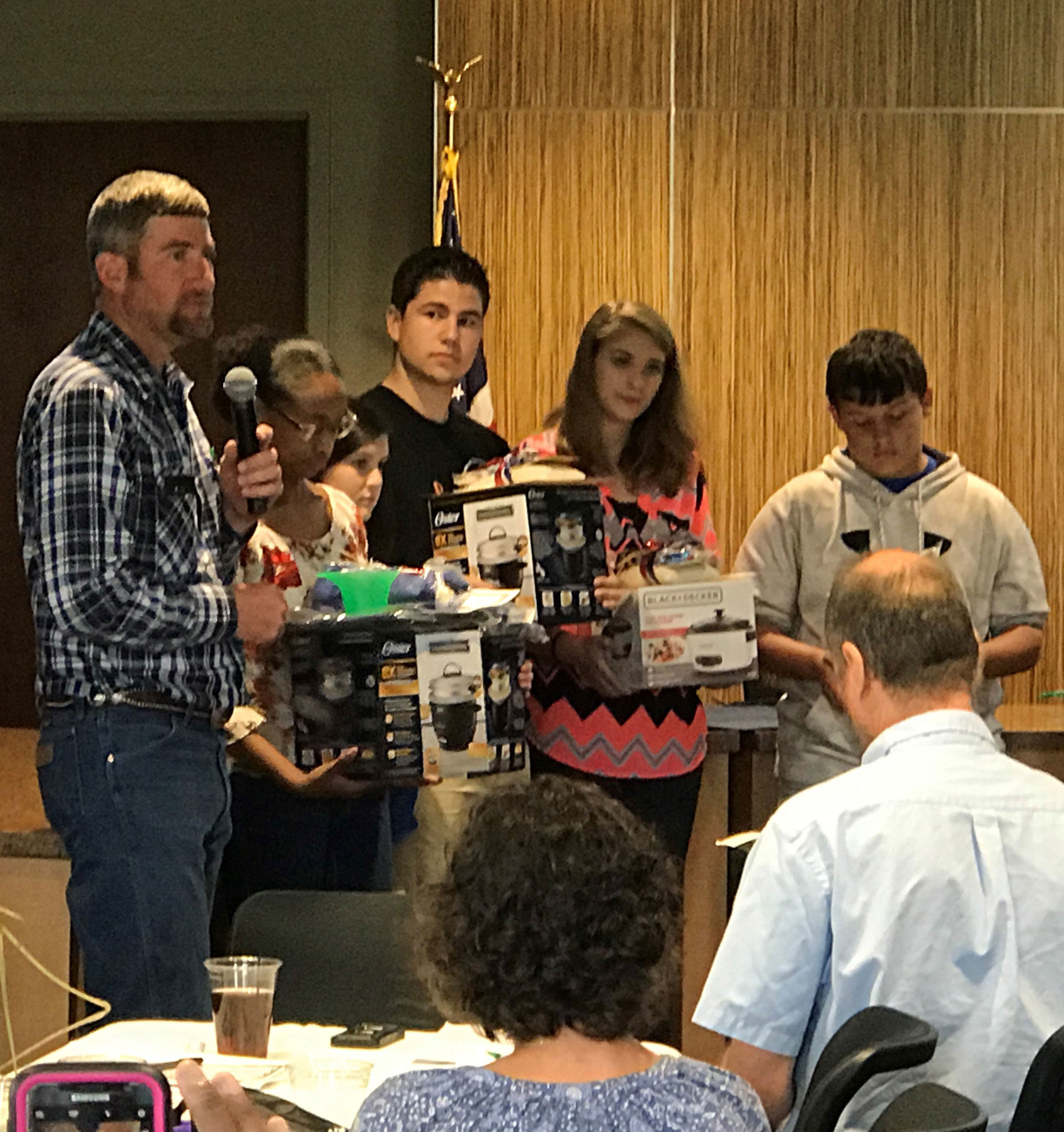 LA-Rice-Cookoff, contestants holding rice cooker prizes