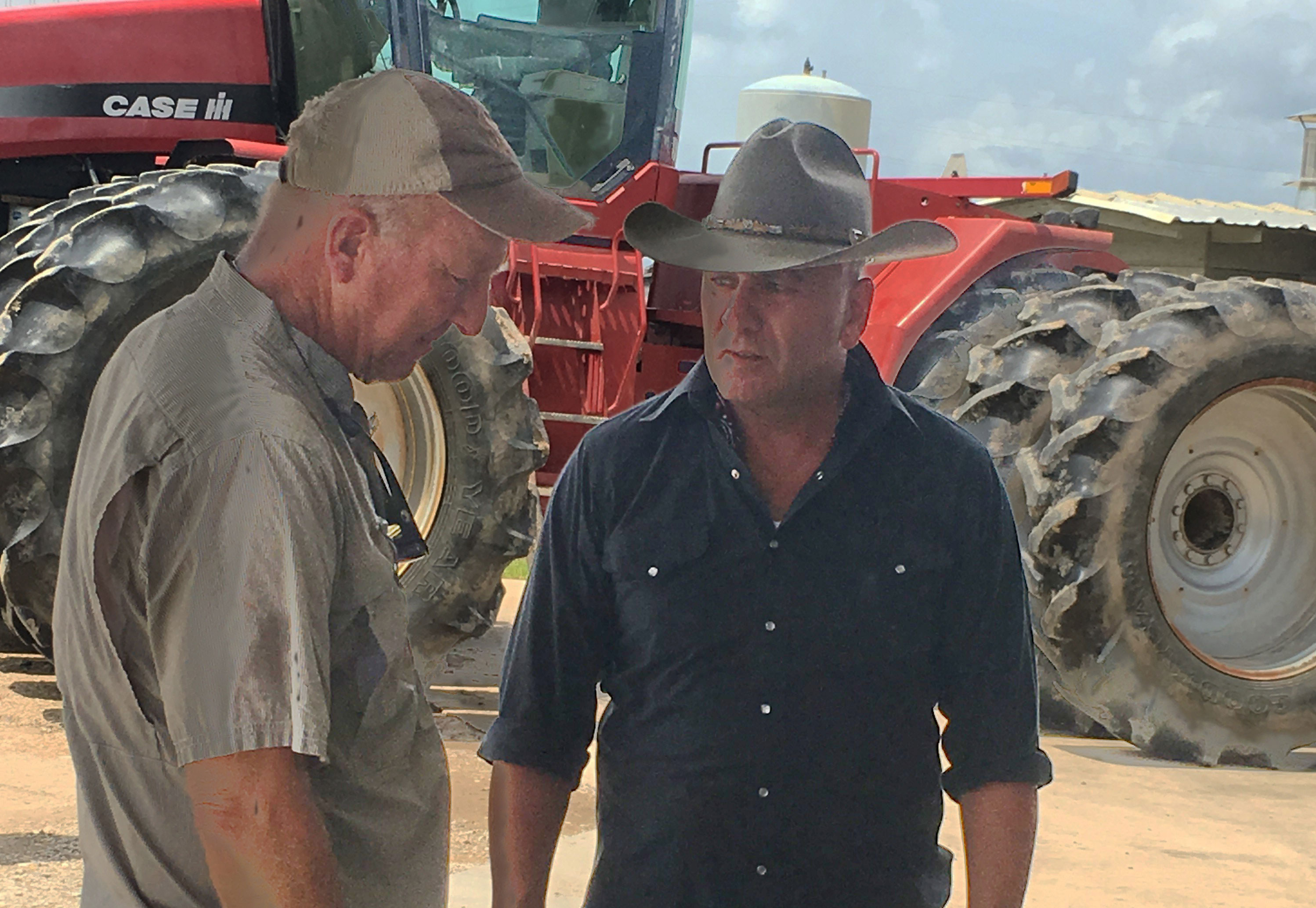 Rep-Clay-Higgins-with Fred Zaunbrecher in front of red combine