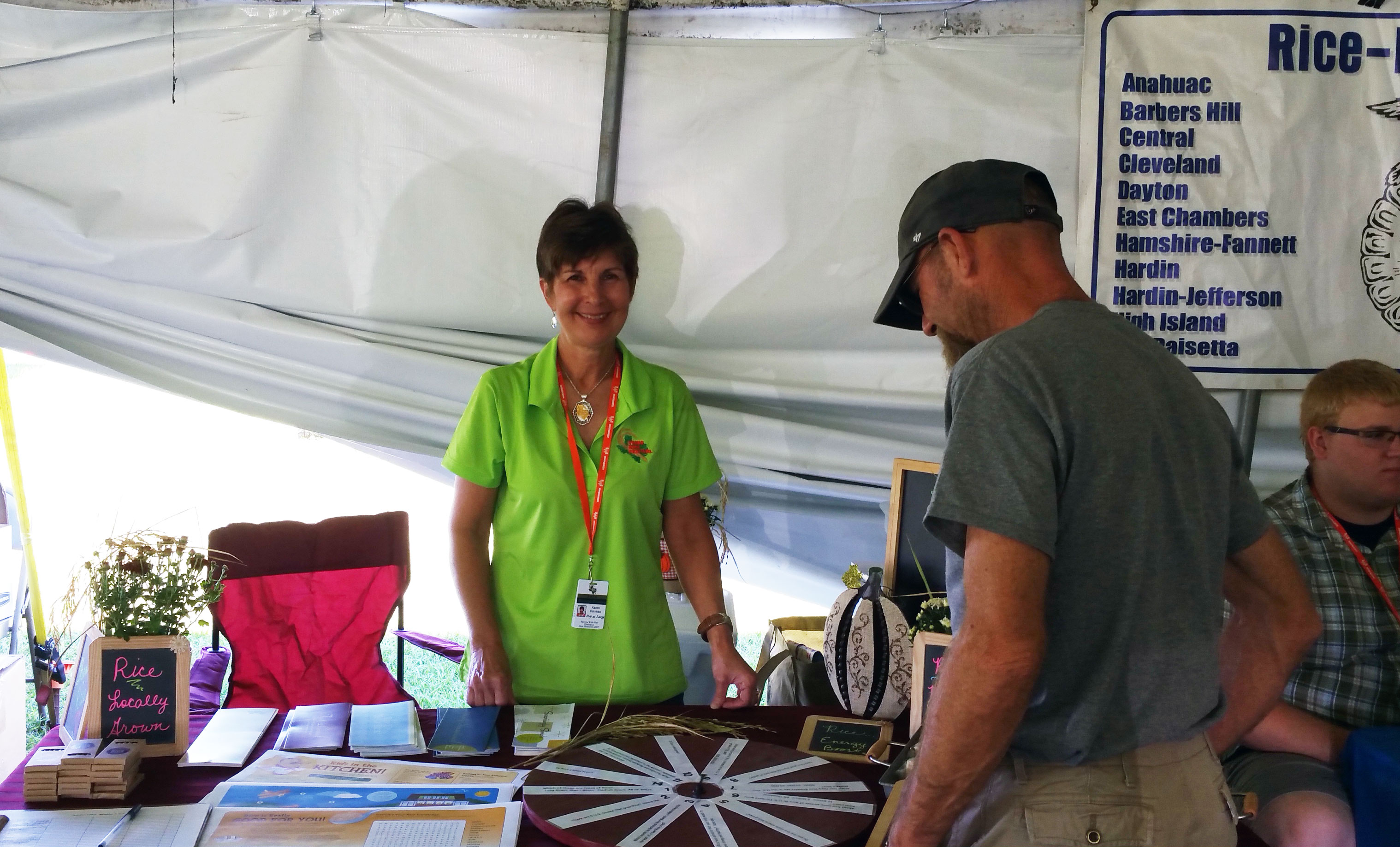 2016 Texas-Rice-Festival,-Karen-Reneau welcomes visitors to the booth