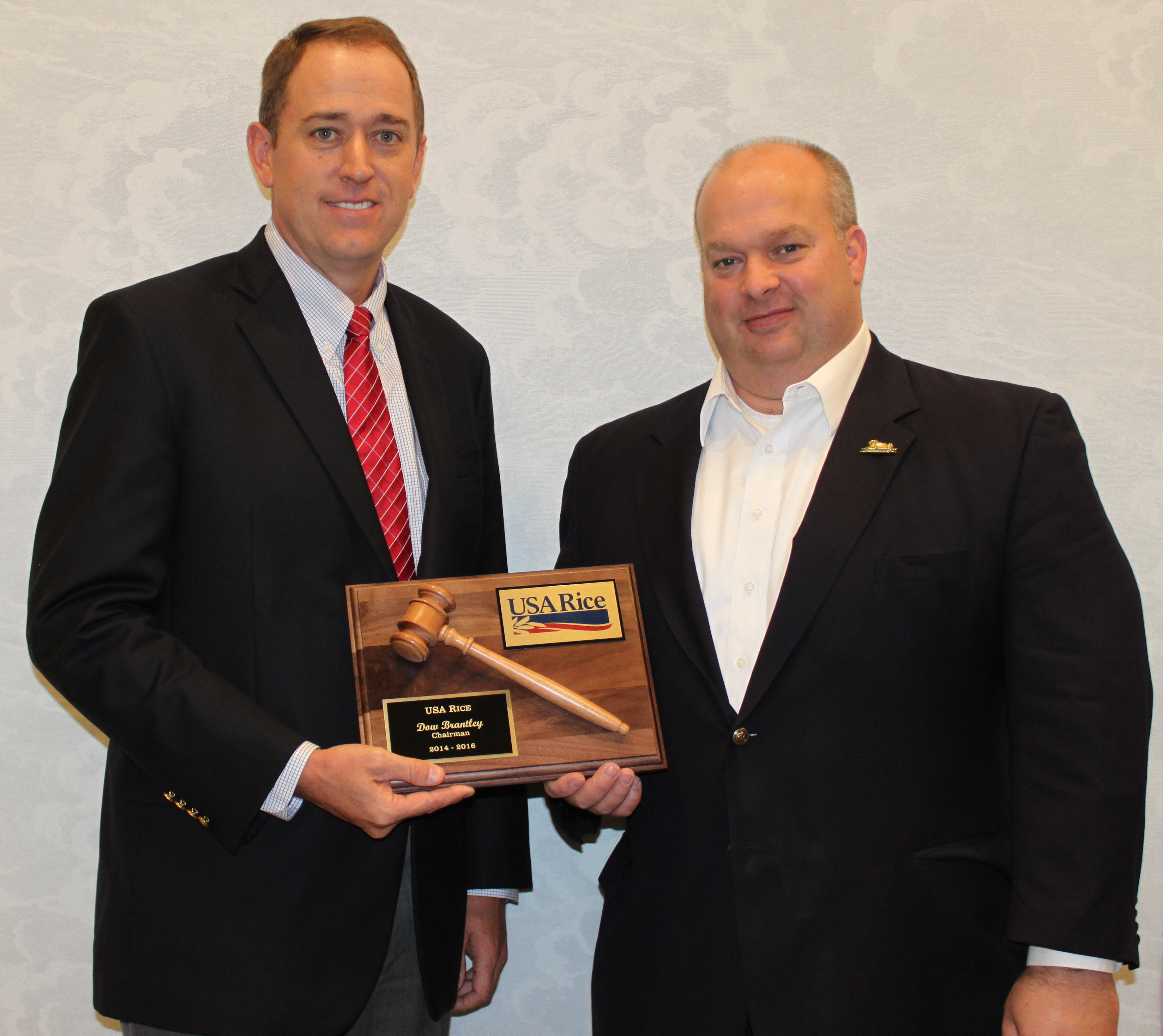 Dow Brantley receiving award from Brian King