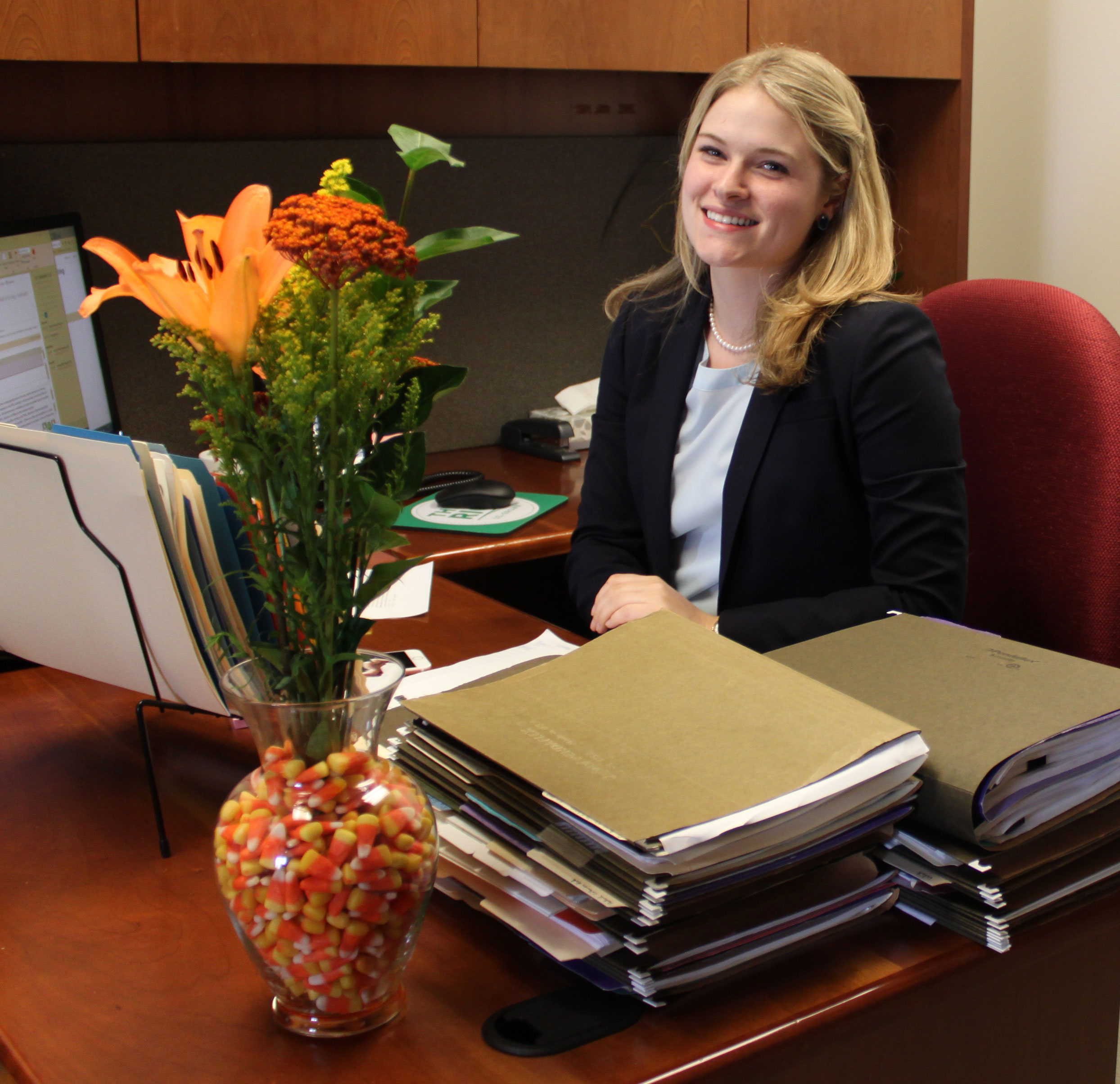 Lydia-Holmes-at her desk at USA Rice 
